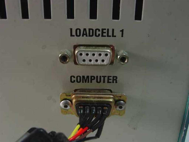 Advanced Imaging Robo4 rear panel close-up showing LOADCELL 1 DB-9 port and COMPUTER DB-9 RS-232 port with wiring