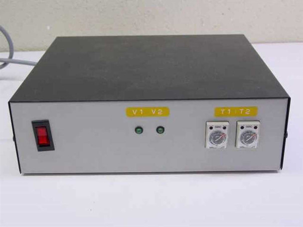 Front panel of standalone timer and valve control box showing power switch, V1 V2 LED indicators, and T1 T2 dial timers