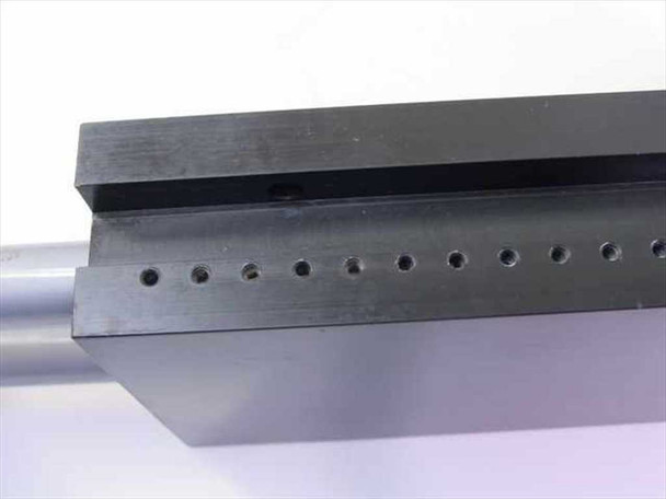 PHD MS062X6-E-V linear slide body close-up showing row of tapped mounting holes along the side of the black aluminum carriage