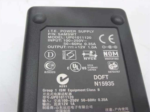ITE external power supply UP01011120 label showing 100-250V input, 12V 1.0A output