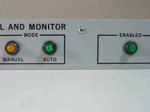 LNR Communications DC-P2 front panel close-up – Manual and Auto Mode indicators with Mode legend, Enabled indicator in green