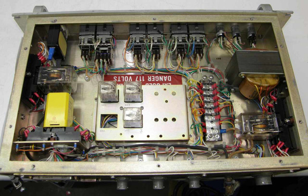 LNR Tridundant LNA – internal view showing wiring harness, transformers, relay bank, and 117V danger label