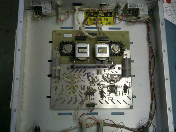 Scientific Atlanta 8761 LNA Power Supply – internal view showing dual transformer assembly, PCB, high-voltage warning label, and internal wiring harness