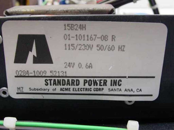 Standard Power Inc 15B24H label showing model 01-101167-08 R, 115/230V 50/60 Hz input, 24V 0.6A output, Acme Electric Corp subsidiary