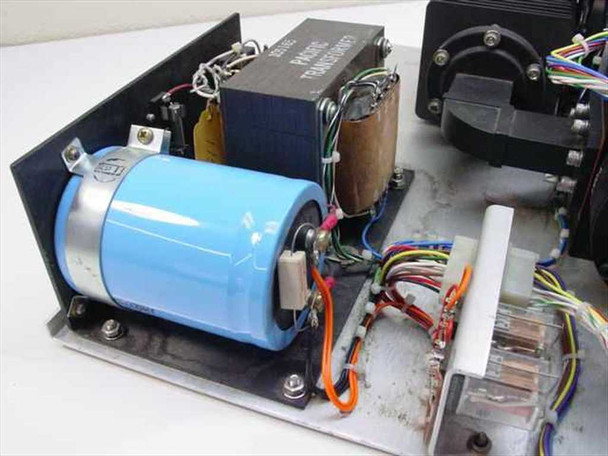 Top view of Sector Motor SM3-151-3 assembly showing large blue capacitor, Pacific transformer, wiring harness, and relay section on aluminum baseplate