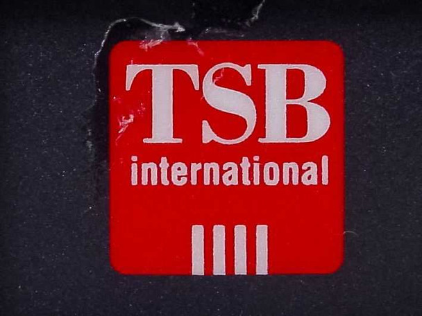 TSB International logo closeup – red square label with white lettering reading TSB International