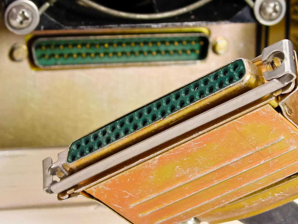 Close-up of D-Sub 25-pin connector on LNR UC6-D1 rear panel showing gold-plated contacts and metal backshell
