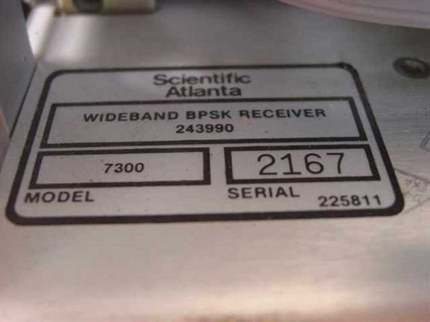 Scientific Atlanta 7300 Wideband BPSK Receiver data plate showing model 7300, part number 243990, and serial number 2167