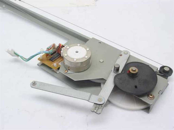 Rear three-quarter view of linear carriage mechanism showing stepper motor, gear/pulley drive wheel, and driver PCB with wire harness