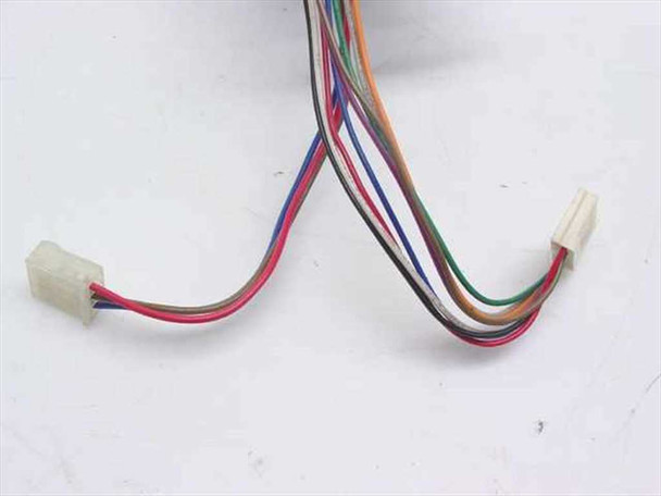 Multi-wire harness detail — two white multi-pin connectors on approximately 14-16 colored wires