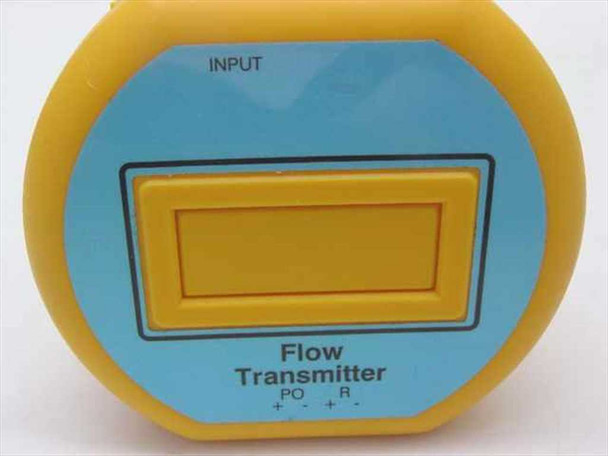Unbranded Flow Transmitter front face close-up showing INPUT label at top, rectangular indicator panel, and PO R plus/minus adjustment markings