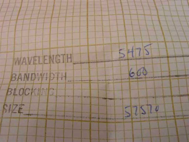 Oriel 57570 filter spec card showing wavelength 547.5 nm, bandwidth 600, model number 57570