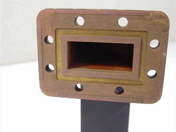 Neico Microwave 20481-1 WR62 waveguide – close-up of rectangular flanged port face showing brass inner bore and bolt pattern