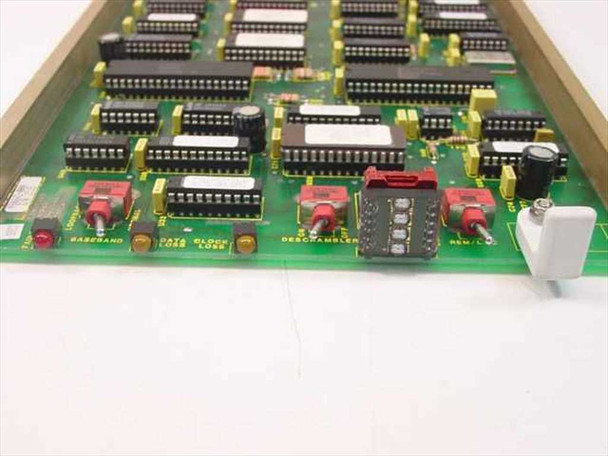 Fairchild 980842-000 PCB front panel area closeup showing BASEBAND, DATA BLOCK LOSS, DESCRAMBLER, and REMOTE LED/switch indicators