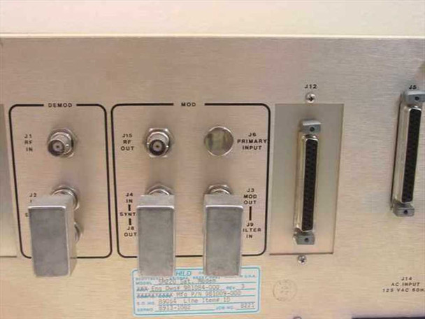 Fairchild SM220 rear panel close-up showing DEMOD RF IN, MOD RF OUT BNC connectors, J6 Primary Input, MOD OUT, and FILTER IN ports