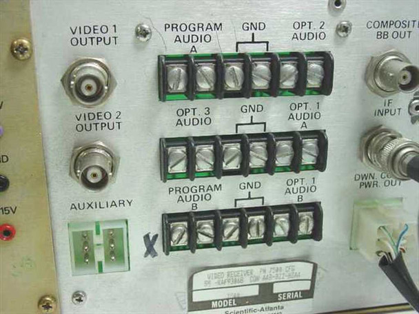 Scientific Atlanta 7500 Video Receiver — rear center panel showing Video 1 Output, Video 2 Output, Composite BB Out BNC connectors, Auxiliary connector, Program Audio and optional audio screw terminal blocks, and model/serial label