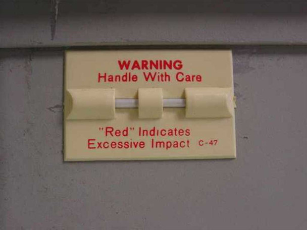 Avantek ASAT-1214-002 – shock-indicator label reading 'Handle With Care – Red Indicates Excessive Impact C-47'