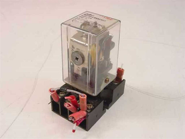 AMF Potter & Brumfield KAP11DG relay with clear plastic cover seated on black connection bracket socket — front-left view