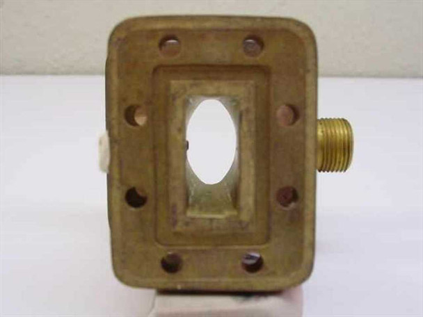 Andrew 55001-90 WR90 Pressure Window Assembly – top-down view showing rectangular waveguide aperture, oval window, and side-mounted coaxial port