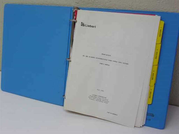 Liebert 74-0000622 UPS User Manual – binder open showing title page and colored tab dividers