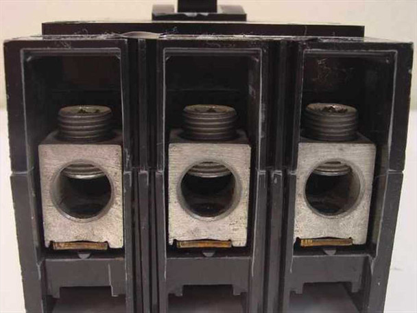 Square D KAL-36125 load-side terminals close-up — three aluminum lug terminals with set screws, minor oxidation visible