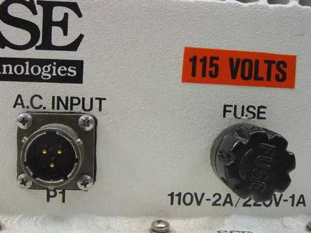 SSE Technologies 310-038336-120B front panel closeup showing AC INPUT circular connector P1 labeled 115 VOLTS and fuse rated 110V-2A / 220V-1A