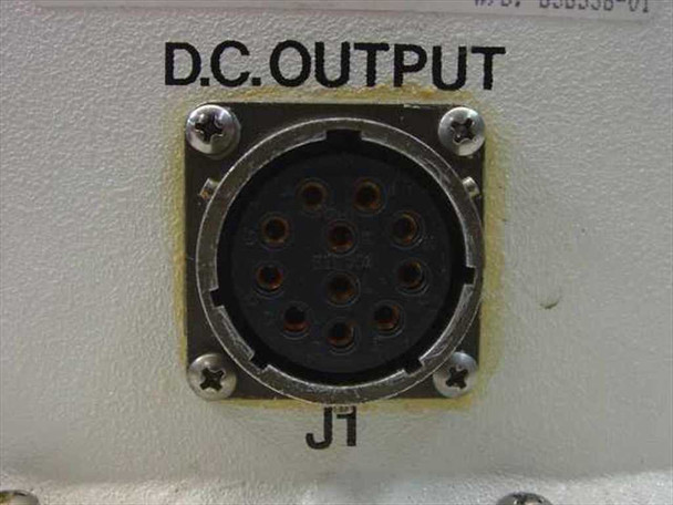 SSE Technologies 310-038336-120B DC OUTPUT 9-pin circular connector J1 closeup on front panel