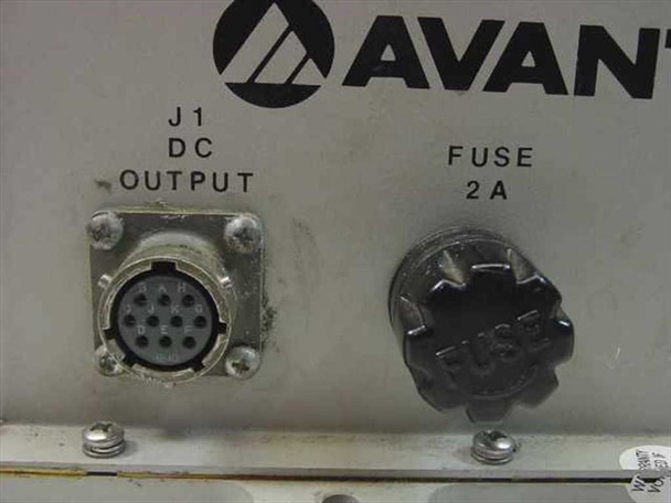 Close-up of Avantek PS-110-002 front panel J1 DC output multi-pin circular connector and 2A fuse holder