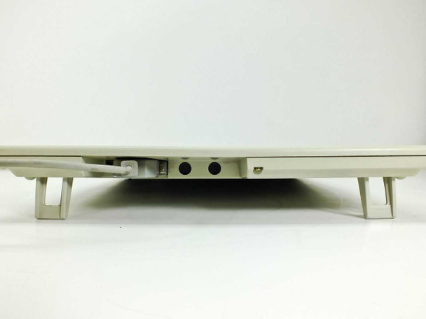 Hitachi HDG-1212D ComGraph Tablet Digitizer – side profile view showing two DIN-style ports on one edge and fold-out feet