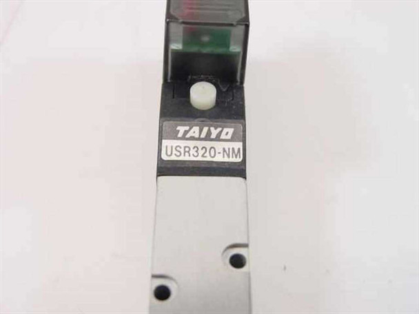 Close-up of Taiyo USR320-NM model label on valve body