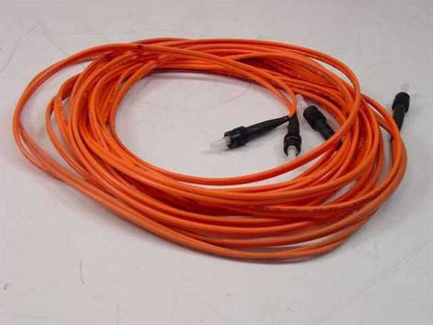 Siecor OFNR multimode fiber optic patch cable coiled, orange jacket, ST duplex connectors visible at end