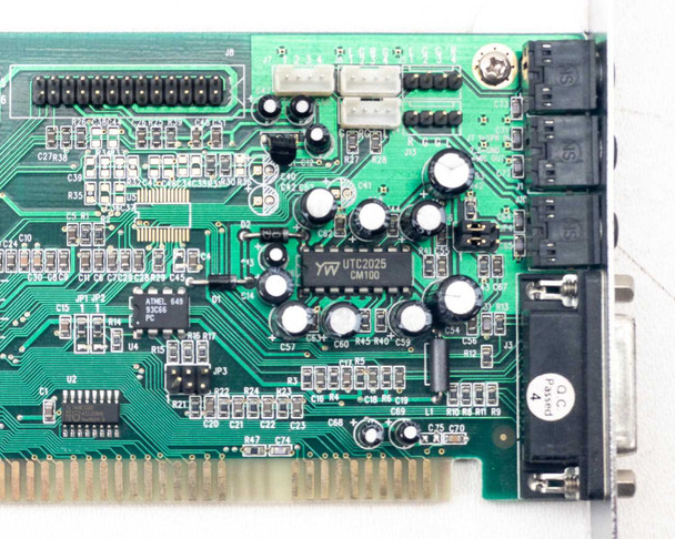 BTC 1853L PCB underside close-up showing YM UTC2025 CM100 secondary IC and solder-side component detail