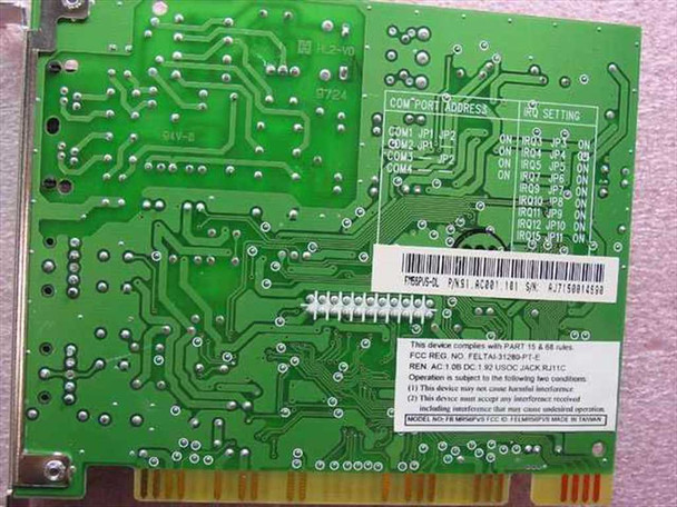 Rockwell MR56PVS ISA modem card PCB reverse side showing COM port address/IRQ jumper settings table and FCC label
