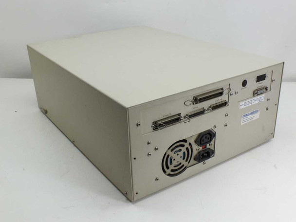 Talaris Systems 20-1100209 Printstation — rear three-quarter view showing parallel, serial, and print engine connectors, cooling fan, dual IEC AC power connectors, and upper right serial/parallel ports