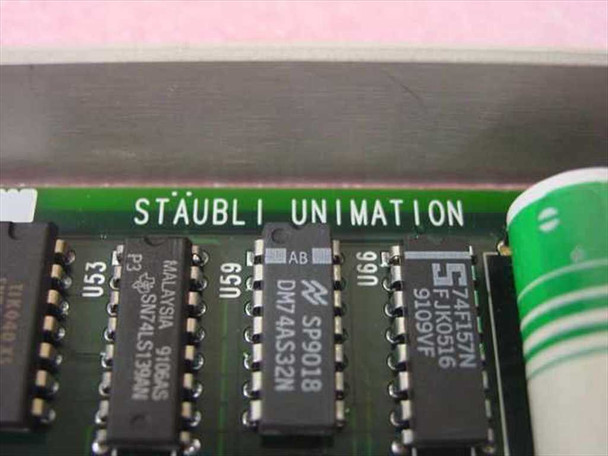 Staubli Unimation W.211.118.00 SCM III card — close-up of PCB silkscreen showing STAUBLI UNIMATION brand marking and visible ICs including DM74AS32N and SP9018