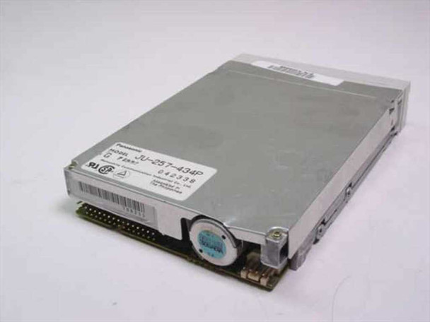 Panasonic JU-257-434P floppy drive – bottom and rear angled view showing 34-pin connector, spindle motor, and label