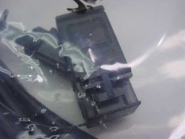Close-up of multi-pin locking connector on opposite end of FSI 905143-025 Rev C cable