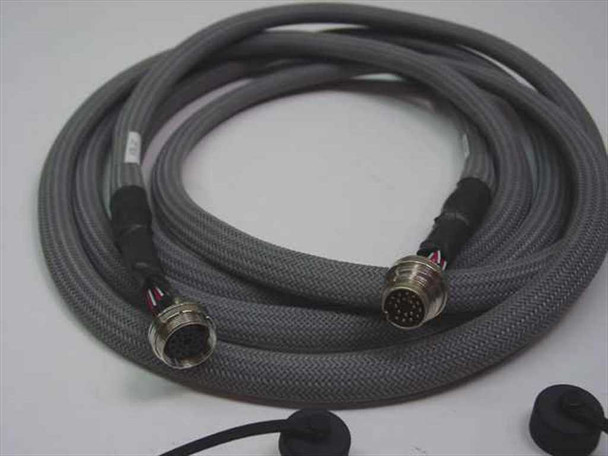 FSI D231229000 cable laid flat showing both multi-pin circular connector ends and gray braided jacket