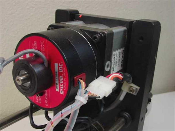 Mycom BRA85-10 red stepper motor close-up showing Mycom Inc label, motor body, and white multi-pin wiring connector