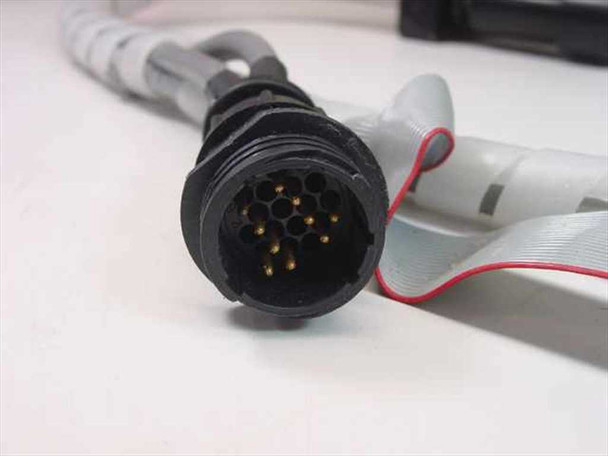 Mycom BRA85-10 multi-pin circular connector close-up showing approximately 12 gold pins in rubber-sealed housing