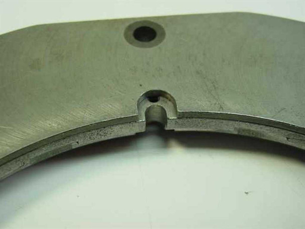 Close-up of rotation engagement slot on the inner rotating ring section showing machined profile