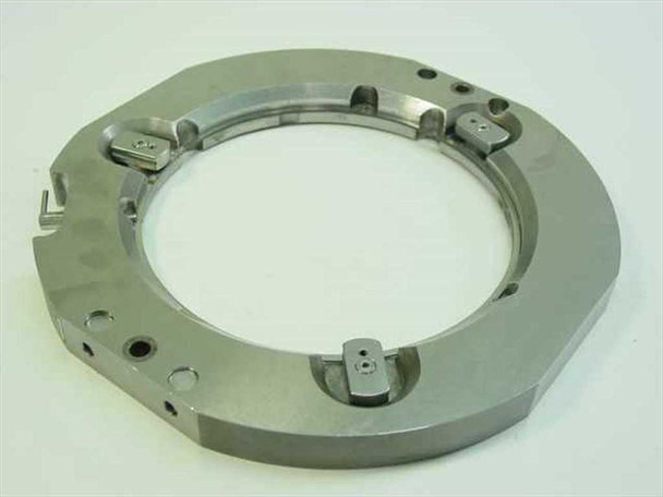 Stainless steel tick mark flange top view showing OD 8.75" ring with four alignment clip assemblies and bolt holes