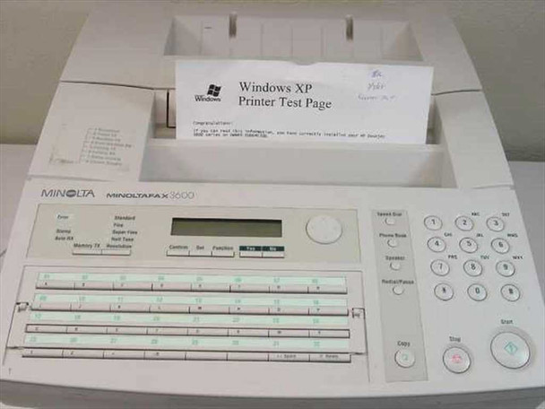Minolta Minoltafax 3600 front panel top view – MINOLTAFAX 3600 branding, LCD display, full keypad, and Windows XP Printer Test Page in output