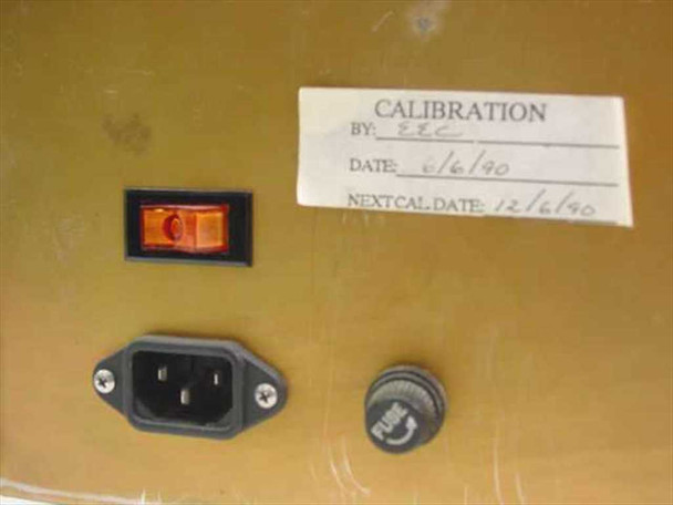 Elite Engineering Electrode Test Station — rear panel close-up of IEC power inlet, rocker power switch, fuse holder, and calibration label dated 6/6/90