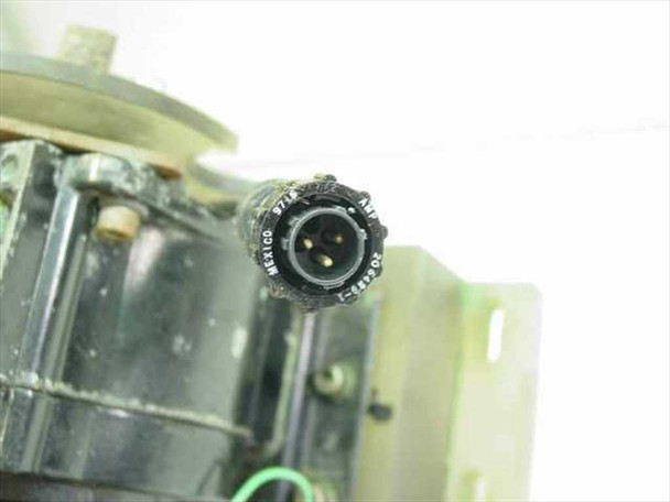 Close-up of 3-pin circular wiring connector on Dayton 3M328A gear motor showing connector body with corrosion and Mexico origin marking