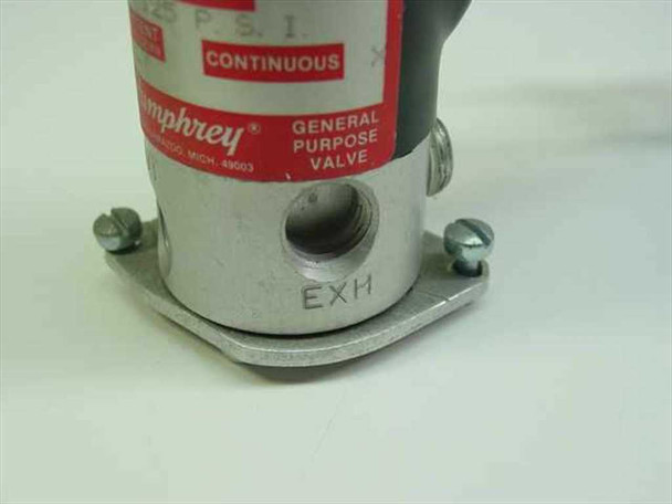 Humphrey solenoid valve base closeup showing EXH port opening and mounting plate with screws