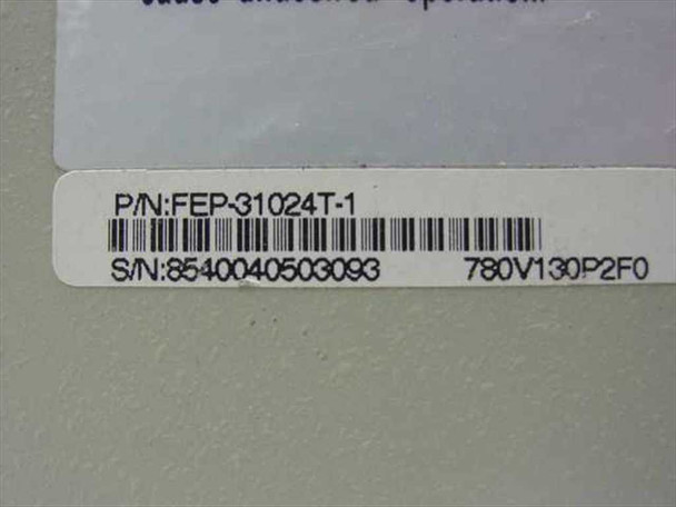 Unicom Dyna-Switch/24 bottom label showing P/N: FEP-31024T-1 and serial number barcode