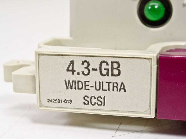 Compaq 242801-001 caddy front label closeup reading 4.3-GB Wide-Ultra SCSI with part 242591-013