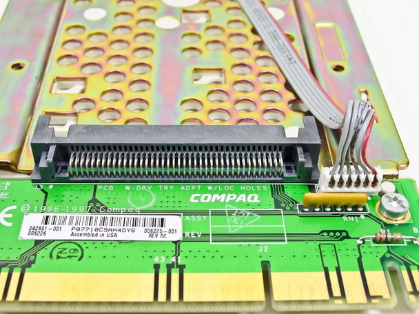 Compaq 242801-001 caddy rear closeup showing 80-pin Wide Ultra SCSI connector on PCB and Compaq branding
