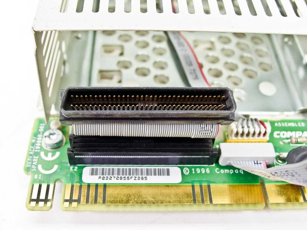 Compaq 199880-001 caddy – angled view of 68-pin SCSI edge connector on carrier PCB with 1996 Compaq copyright marking